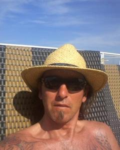 Man, 60. Scarbelly