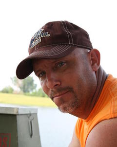 Man, 56. single_Travis