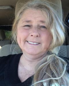 Woman, 66. Tan56