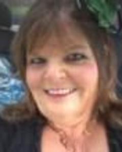 Woman, 65. Fatinah